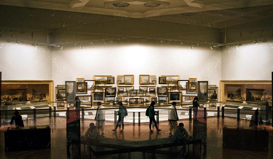 People looking at art in a museum