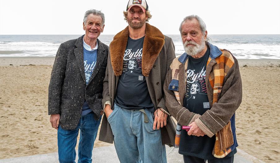 Terry’s fellow Monty Python’s Michael Palin and Terry Gilliam, on Colwyn Bay Promenade at the site of the statue, with its creator Nick Elphick
