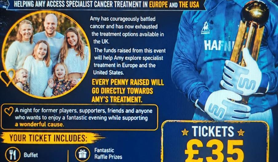 Blue and black colourway with a picture of goalkeeper neville southall promoting his charity fundraiser